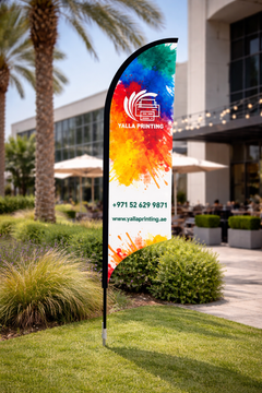 Custom Printed Double Sided Curved Top Flag with Ground Spike – Premium Satin Fabric Advertising Flag | 2 Printed Fabrics Stitched Together for Double Side View | Outdoor Promotional Display | Yalla Printing UAE