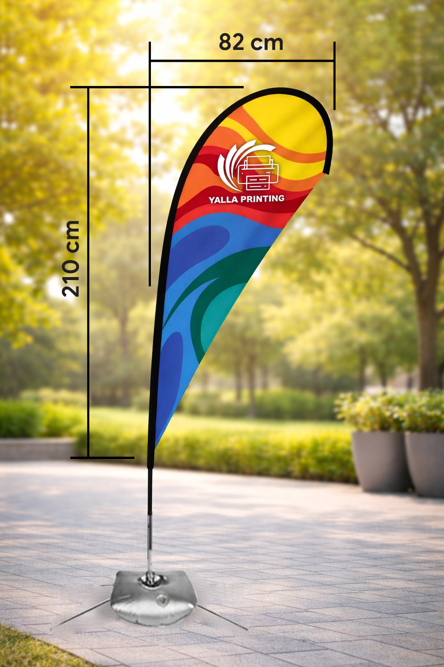 Custom Printed Double Sided Teardrop Flag with Cross Base & Water Weight Bag – Premium Satin Fabric Advertising Flag | 2 Printed Fabrics Stitched Together for Double Side View | Indoor & Outdoor Promotional Display | Yalla Printing UAE
