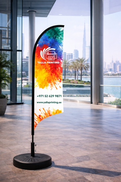 Custom Printed Double Sided Curved Top Flag with Round Black Water Base (32KG) – Premium Satin Fabric Advertising Flag | 2 Printed Fabrics Stitched Together for Double Side View | Indoor & Outdoor Promotional Display | Yalla Printing UAE