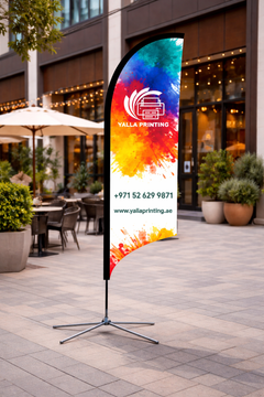 Custom Printed Double Sided Curved Top Flag with Cross Base – Premium Satin Fabric Advertising Flag | 2 Printed Fabrics Stitched Together for Double Side View | Indoor & Outdoor Promotional Display | Yalla Printing UAE