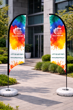 Custom Printed Double Sided Curved Top Flag with Cross Base & Water Weight Bag – Premium Satin Fabric Advertising Flag | 2 Printed Fabrics Stitched Together for Double Side View | Indoor & Outdoor Promotional Display | Yalla Printing UAE