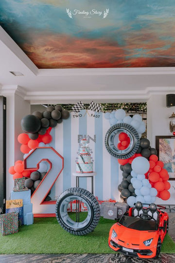Racing-Themed Birthday Party Decor Set - 4 Cutouts: Backdrop Panel, Large Road Number, and Two Tire Props
