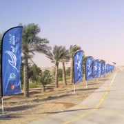 Curved Top Flag – Single-Sided Knitted Polyester, 85x300 cm | Aluminum Pole & Heavy 35kg Water Base | Yalla Printing - Yalla Printing