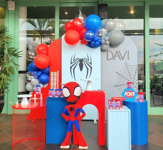 Spider Hero Birthday Decor - 4 Cutouts: Iconic Spider Backdrop, Building Silhouette, and Hero Character